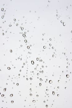 Abstract background. Drops of water on the window. Shallow DOF