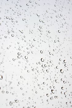 Abstract background. Drops of water on the window. Shallow DOF