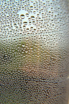 Drops of water on the crooked glass, shallow dof 