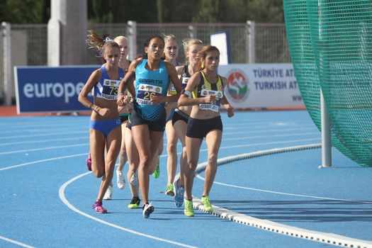 ISTANBUL, TURKEY - SEPTEMBER 19, 2015: Athletes running 1500 metres during European Champion Clubs Cup Track and Field Juniors Group A