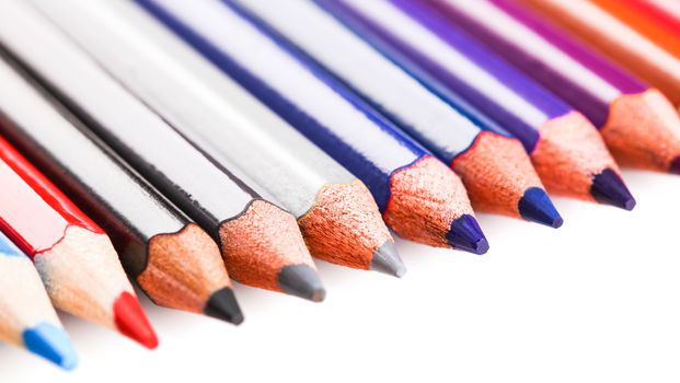 colored pencils close-up while lying in a row