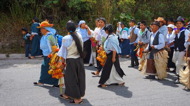 Cuicocha, Imbabura / Ecuador - June 22 2014: Indigenous group celebrating the solstice party near Cuicocha lagoon