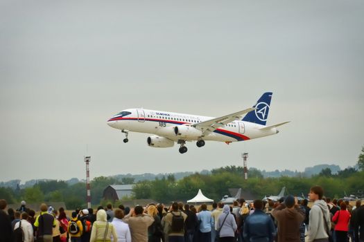 Zhukovsky, Moscow region, Russia - August 24, 2009: The Sukhoi Superjet 100 is a modern fly-by-wire twin-engine regional passenger jet at the International Aviation and Space salon MAKS-2009