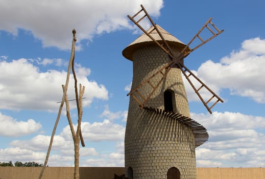 one old mill the sky with clouds. photo