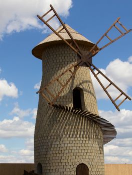 one old mill the sky with clouds. photo