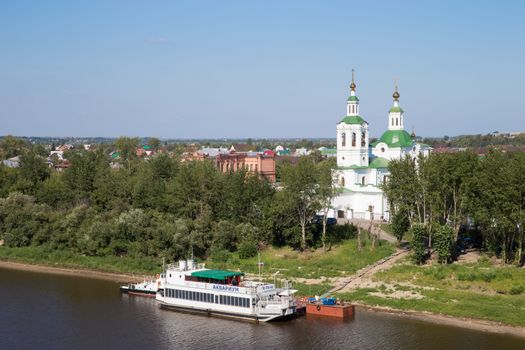 Tyumen, Russia - August 13 2016. Beautiful view to the ship and the church in the background