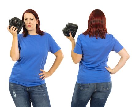 Photo of a woman posing with a blank blue t-shirt and holding a camera, ready for your artwork or design.