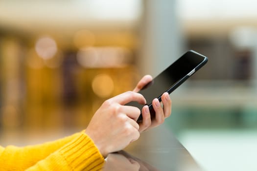 Woman holding cellphone