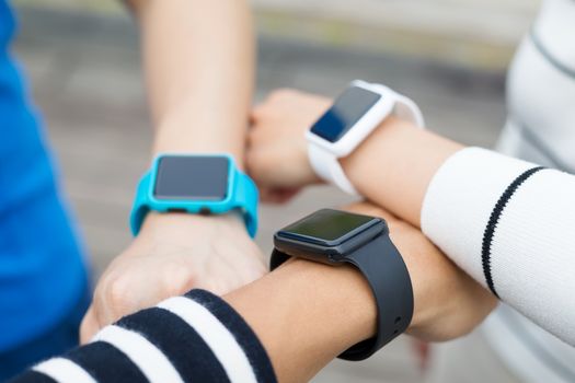 Group of people wearing smartwatch