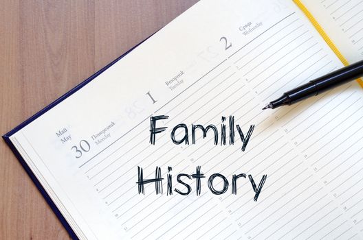 Family history text concept write on notebook with pen