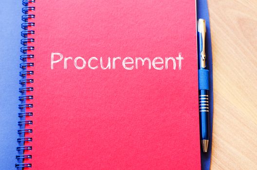 Procurement text concept write on notebook with pen