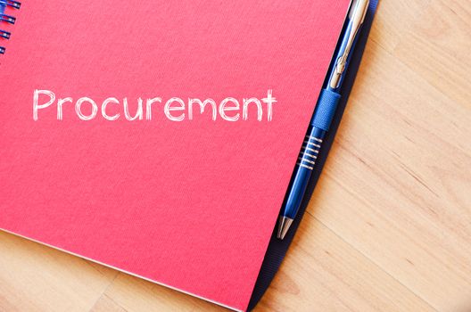 Procurement text concept write on notebook with pen