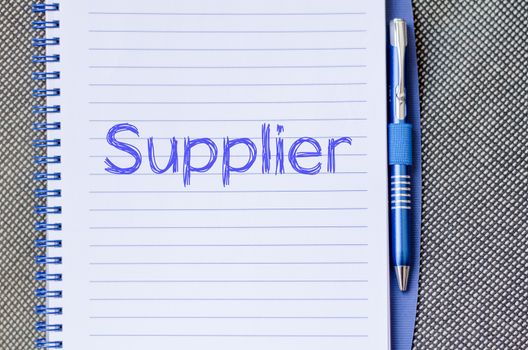 Supplier text concept write on notebook with pen