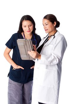 Doctor and Nurse discussing electronic Patient medical chart on tablet, healthcare concept.