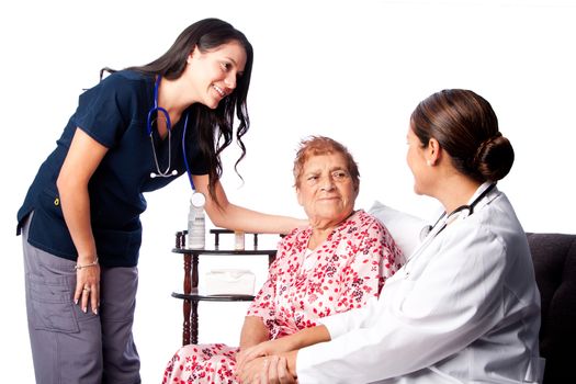 Doctor and Nurse consulting comforting Senior Patient at home health.