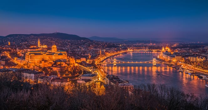 Panoramic View of Budapest with Street Lights and the Danube River at Twilight as Seen from Gellert Hill Lookout Point