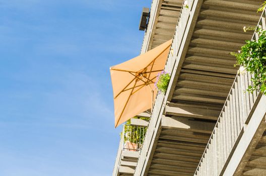 Sunshade on a terrace, view from below.