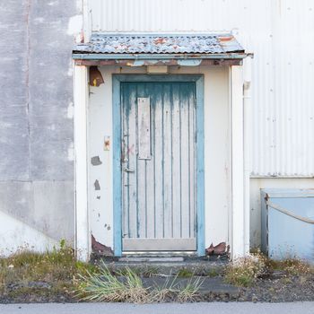 Front view of a boarded-up abandoned building in Iceland - Old USAF base