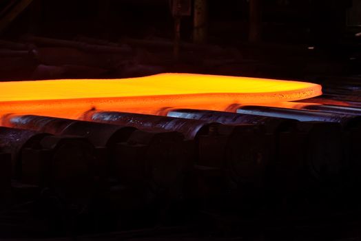 hot steel on conveyor in steel plant