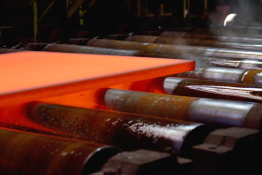 hot plate are rolling in table on conveyor