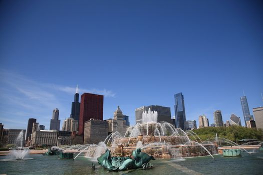 View of Chicago skyscrapers from famous Buckingham Fountain in Grant Park.