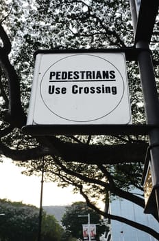 Traffic text sign pedestrian use crossing