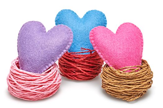 Love heart. Valentines  Day. Handmade hearts in nests. Vintage romantic style. Vivid greeting card, multicolored felt, isolated on white