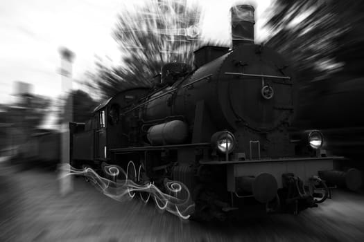 Old train in motion, B/W photo