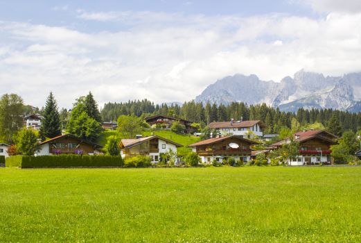 a beautiful view of the austrian alps and Oberndorf in Tirol, Austria