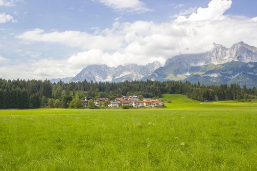 a beautiful view of the austrian alps and Oberndorf in Tirol, Austria