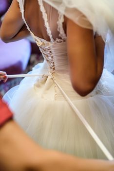 bridesmaid dress lace back, tightening the corset