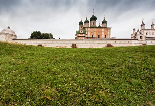 The historic Goritsky monastery in Pereslavl, walls and churches stand on a green slope