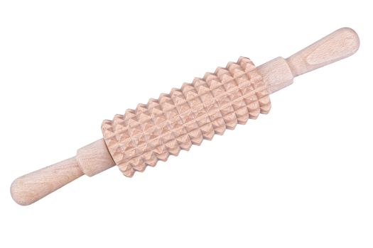 Wooden rolling pin on the dough isolated on a white background