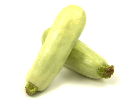 Two ripe bright large Zucchini, isolated on white background.