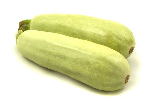 Two ripe bright large Zucchini, isolated on white background.