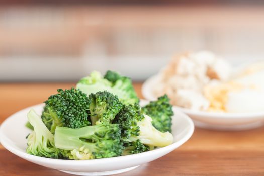 Fresh hydroponic vegetables on wooden table, stock photo