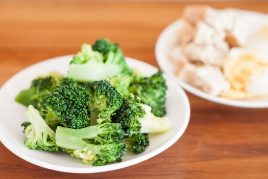 Fresh hydroponic vegetables on wooden table, stock photo