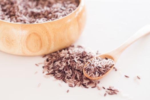 Berry rice in wooden bowl, stock photo