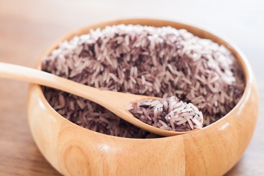 Berry rice in wooden bowl, stock photo