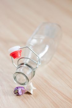 Vintage water bottle on wooden background, stock photo