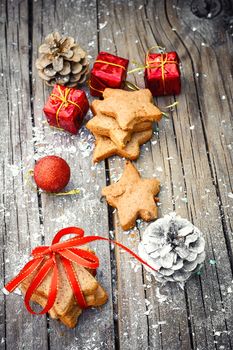 Postcard with Christmas biscuits,pine cones and Christmas ornaments