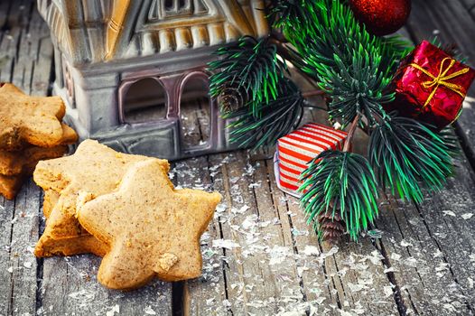 Postcard with Christmas biscuits,pine cones and Christmas ornaments