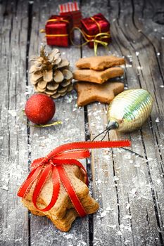 Postcard with Christmas biscuits,pine cones and Christmas ornaments