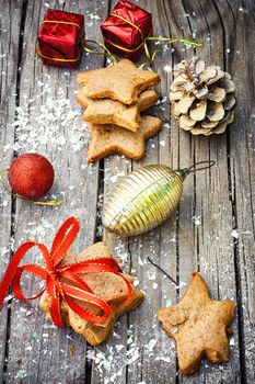 Postcard with Christmas biscuits,pine cones and Christmas ornaments