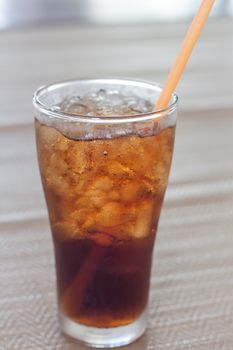 A glass of cola with ice, stock photo