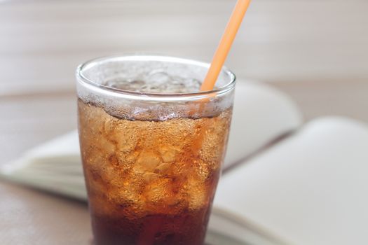A glass of cola with ice, stock photo