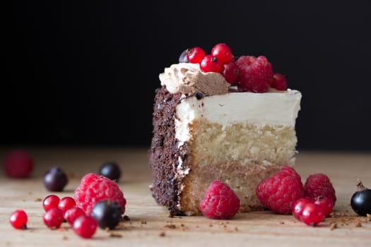 peace of cake decorated with fresh berries