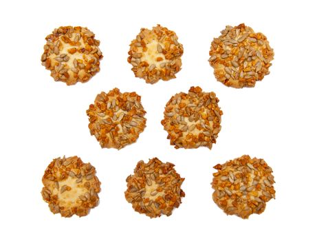 Cookies with nuts and sunflower seeds isolated on the white background