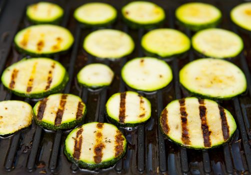 Courgette isolated on the grill background