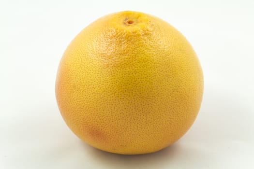Orange large fresh grapefruit, isolated on a white background